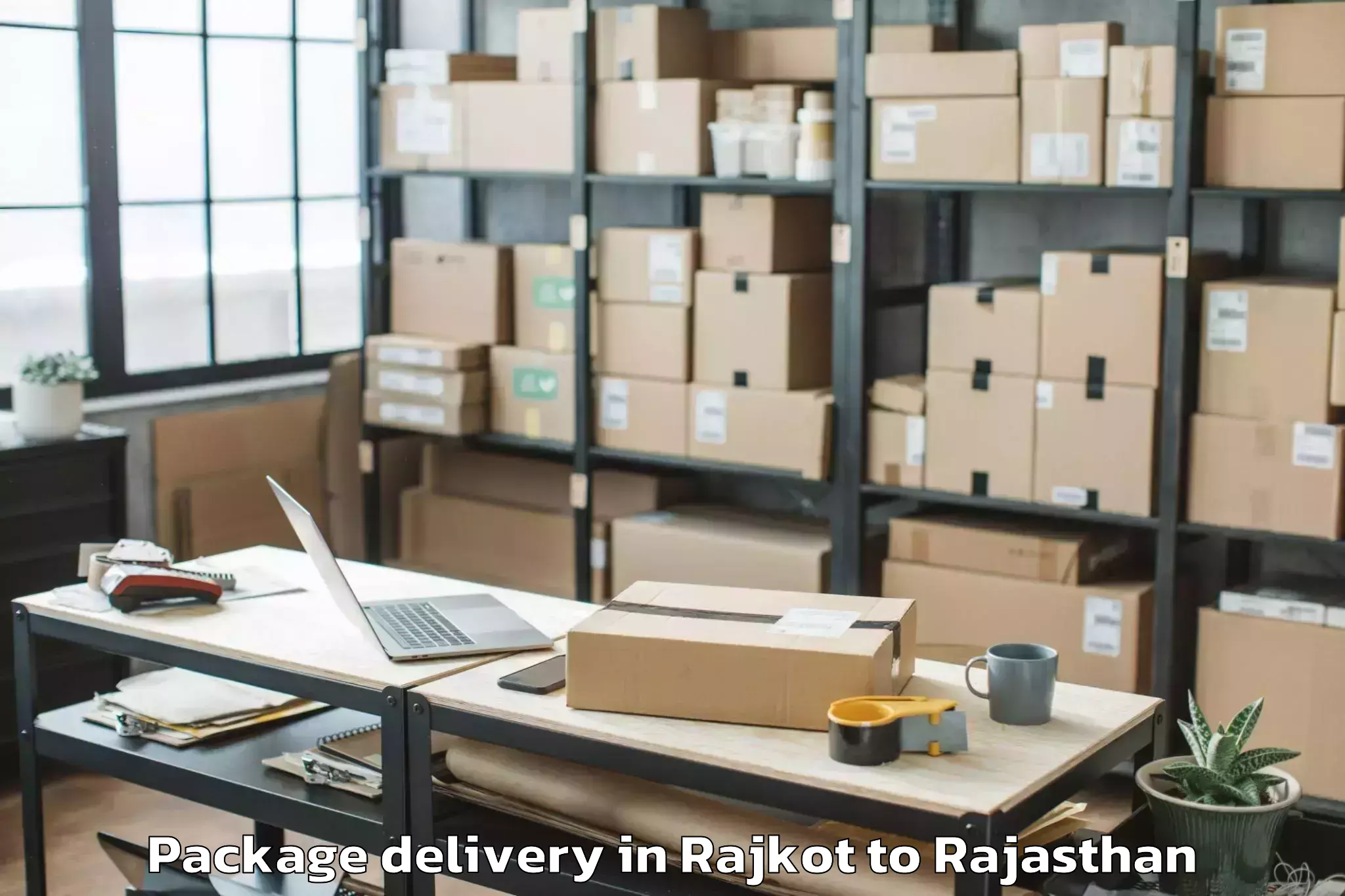 Trusted Rajkot to Chaksu Package Delivery